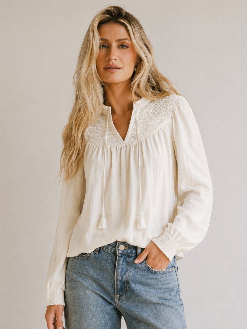 Peasant blouse w. smocked yoke, tassel ties, relaxed fit